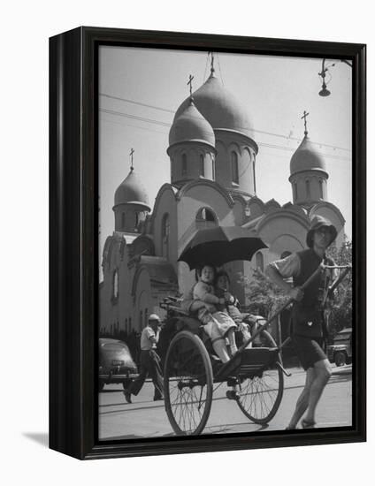 Family Being Pulled in a Rickshaw with a Russian Orthodox Church in the Background-Jack Birns-Framed Premier Image Canvas