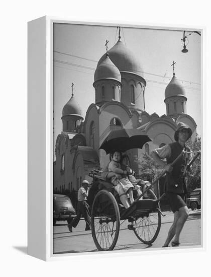 Family Being Pulled in a Rickshaw with a Russian Orthodox Church in the Background-Jack Birns-Framed Premier Image Canvas