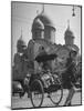 Family Being Pulled in a Rickshaw with a Russian Orthodox Church in the Background-Jack Birns-Mounted Photographic Print