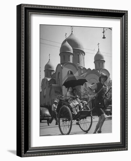 Family Being Pulled in a Rickshaw with a Russian Orthodox Church in the Background-Jack Birns-Framed Photographic Print