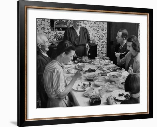 Family Eating at Dinner Table-John Dominis-Framed Photographic Print