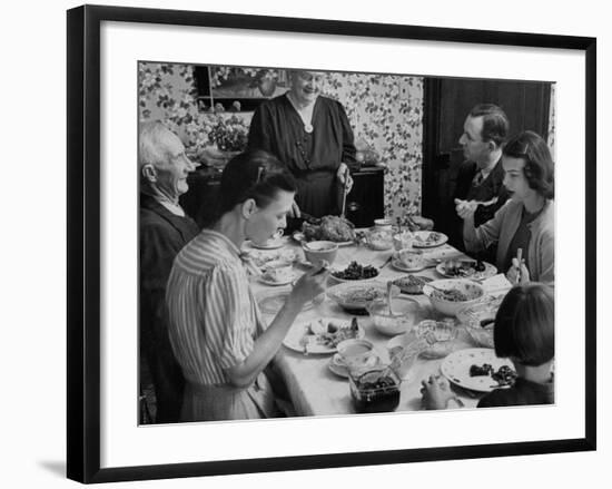 Family Eating at Dinner Table-John Dominis-Framed Photographic Print