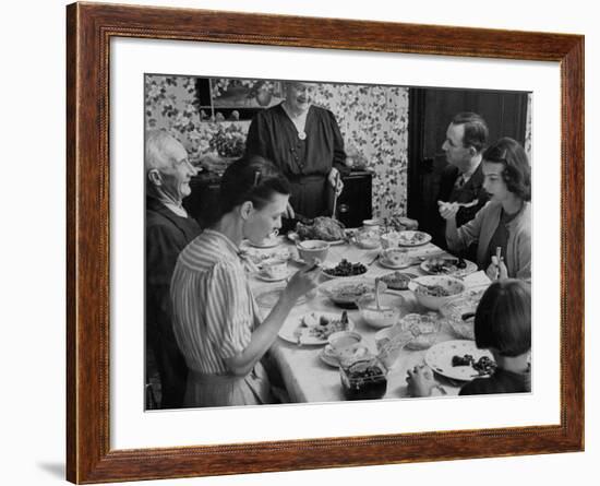 Family Eating at Dinner Table-John Dominis-Framed Photographic Print