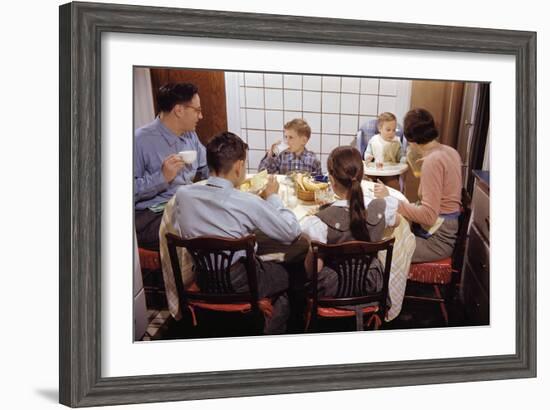 Family Eating Together at Dinner Table-William P. Gottlieb-Framed Premium Photographic Print