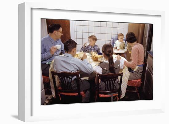 Family Eating Together at Dinner Table-William P. Gottlieb-Framed Premium Photographic Print