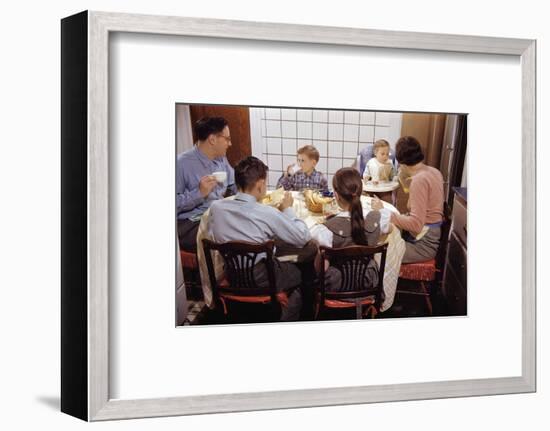 Family Eating Together at Dinner Table-William P. Gottlieb-Framed Premium Photographic Print