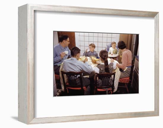 Family Eating Together at Dinner Table-William P. Gottlieb-Framed Premium Photographic Print