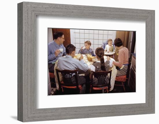 Family Eating Together at Dinner Table-William P. Gottlieb-Framed Photographic Print