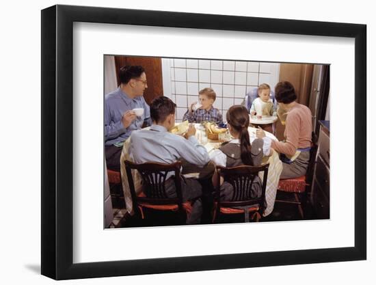 Family Eating Together at Dinner Table-William P. Gottlieb-Framed Photographic Print