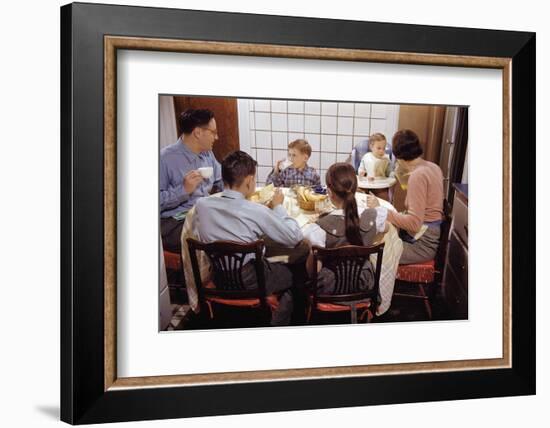 Family Eating Together at Dinner Table-William P. Gottlieb-Framed Photographic Print