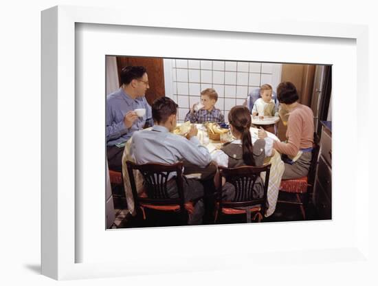 Family Eating Together at Dinner Table-William P. Gottlieb-Framed Photographic Print