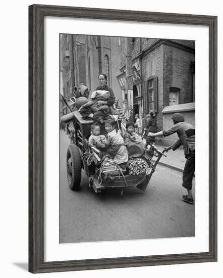 Family Fleeing Shanghai-null-Framed Photographic Print