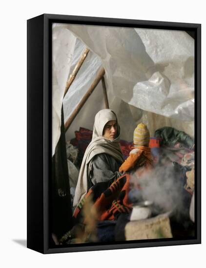 Family from the Quake-Affected Rangwad Village Sits Near a Fireplace in their Makeshift Tent, India-null-Framed Premier Image Canvas