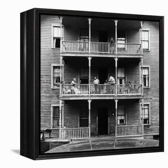 Family on Balcony of Apartment Building-Gordon Parks-Framed Premier Image Canvas