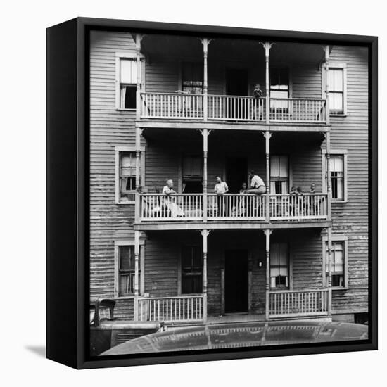 Family on Balcony of Apartment Building-Gordon Parks-Framed Premier Image Canvas