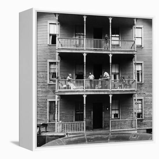 Family on Balcony of Apartment Building-Gordon Parks-Framed Premier Image Canvas