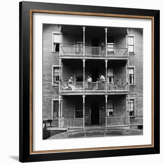 Family on Balcony of Apartment Building-Gordon Parks-Framed Premium Photographic Print