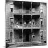 Family on Balcony of Apartment Building-Gordon Parks-Mounted Premium Photographic Print