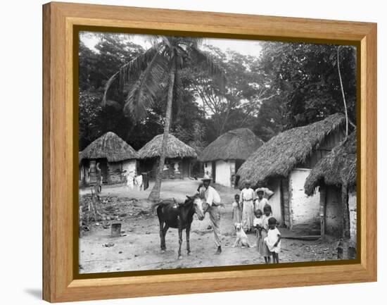 Family Outside their Home, Coolie Street, Kingston, Jamaica, 1931-null-Framed Premier Image Canvas