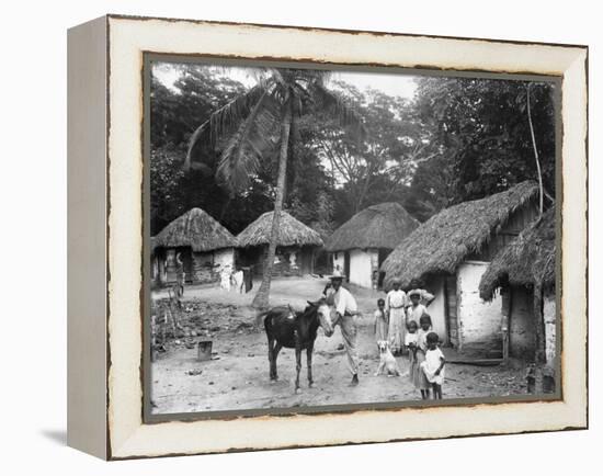 Family Outside their Home, Coolie Street, Kingston, Jamaica, 1931-null-Framed Premier Image Canvas