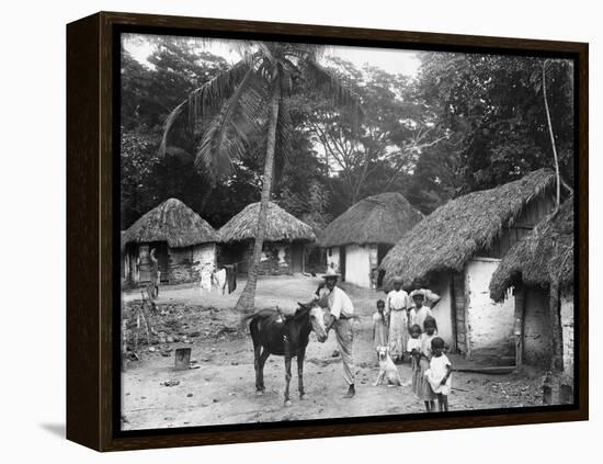 Family Outside their Home, Coolie Street, Kingston, Jamaica, 1931-null-Framed Premier Image Canvas