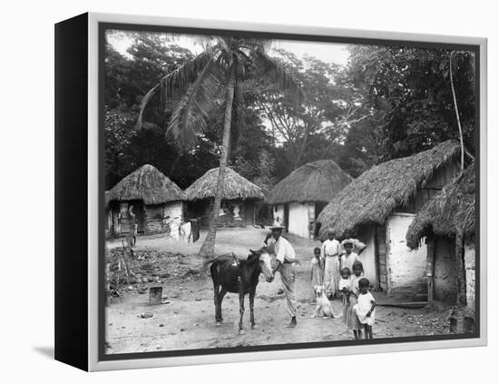 Family Outside their Home, Coolie Street, Kingston, Jamaica, 1931-null-Framed Premier Image Canvas