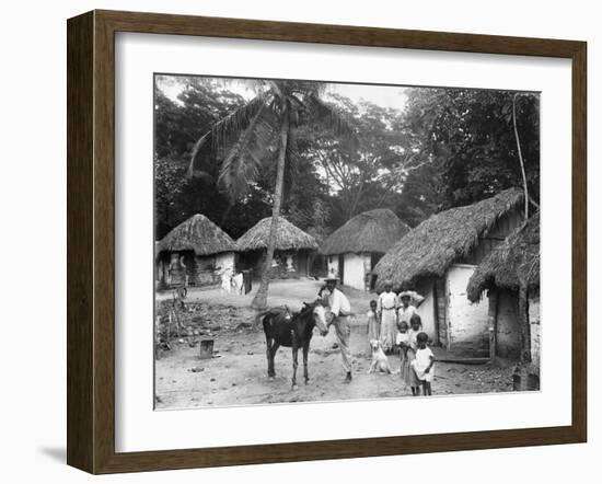 Family Outside their Home, Coolie Street, Kingston, Jamaica, 1931-null-Framed Photographic Print