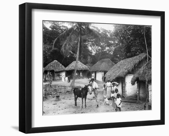 Family Outside their Home, Coolie Street, Kingston, Jamaica, 1931-null-Framed Photographic Print