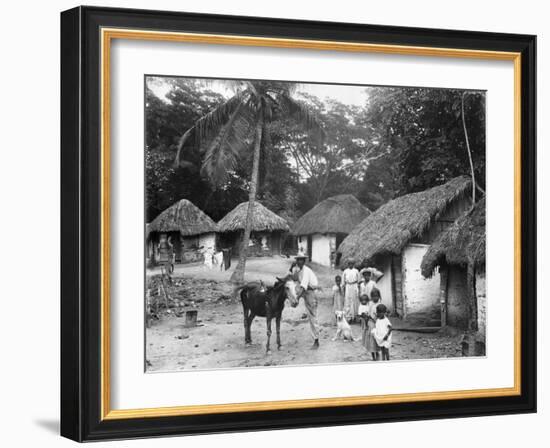 Family Outside their Home, Coolie Street, Kingston, Jamaica, 1931-null-Framed Photographic Print