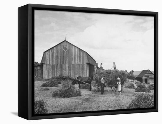 Family Praying During Farm Work-John Phillips-Framed Premier Image Canvas