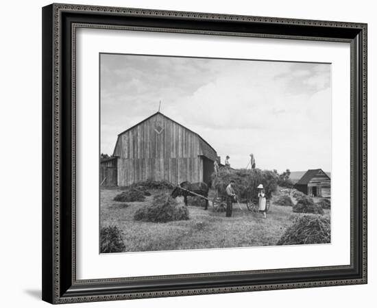 Family Praying During Farm Work-John Phillips-Framed Photographic Print