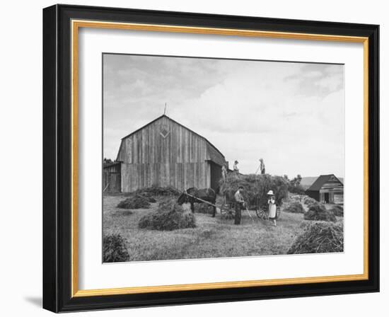Family Praying During Farm Work-John Phillips-Framed Photographic Print