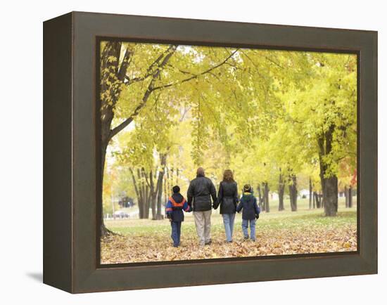 Family Walking in the Park-null-Framed Premier Image Canvas