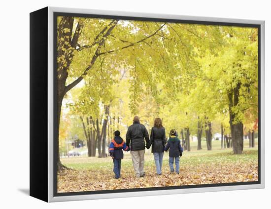 Family Walking in the Park-null-Framed Premier Image Canvas