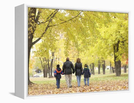Family Walking in the Park-null-Framed Premier Image Canvas