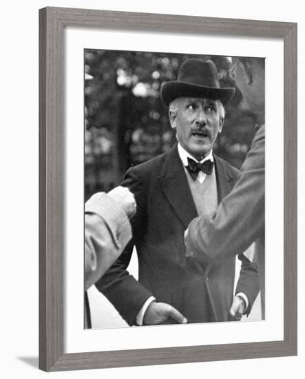 Famous Maestro Arturo Toscanini Stopping in Street and Talking to 2 Men-Alfred Eisenstaedt-Framed Premium Photographic Print