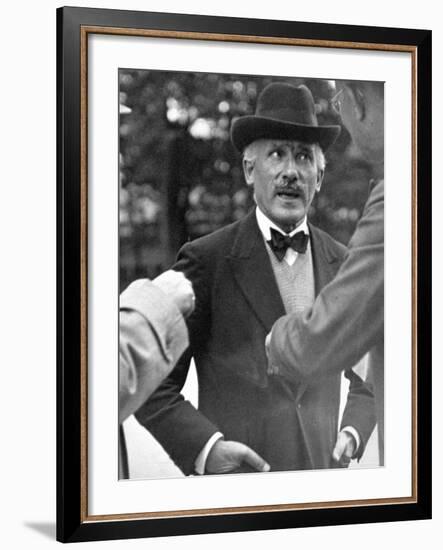 Famous Maestro Arturo Toscanini Stopping in Street and Talking to 2 Men-Alfred Eisenstaedt-Framed Premium Photographic Print