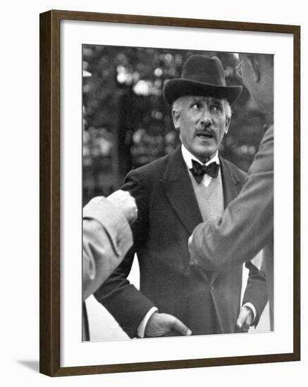 Famous Maestro Arturo Toscanini Stopping in Street and Talking to 2 Men-Alfred Eisenstaedt-Framed Premium Photographic Print