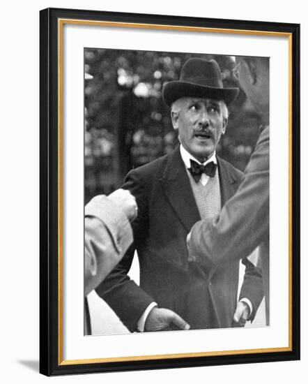 Famous Maestro Arturo Toscanini Stopping in Street and Talking to 2 Men-Alfred Eisenstaedt-Framed Premium Photographic Print