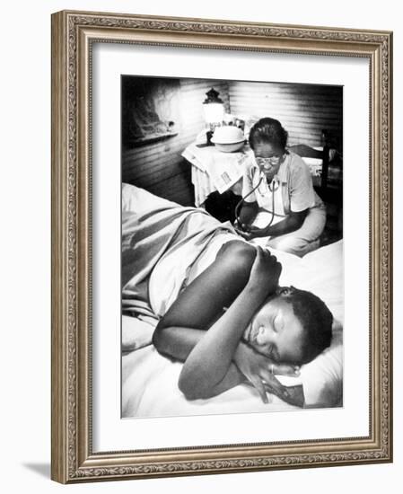 Famous Midwife-Nurse Maude Callen, Attending a Woman in Labor-W^ Eugene Smith-Framed Photographic Print