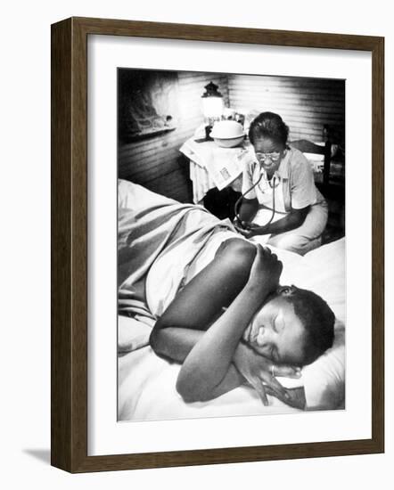 Famous Midwife-Nurse Maude Callen, Attending a Woman in Labor-W^ Eugene Smith-Framed Photographic Print