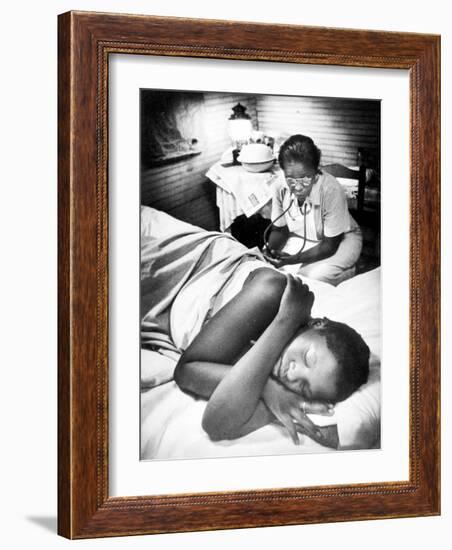 Famous Midwife-Nurse Maude Callen, Attending a Woman in Labor-W^ Eugene Smith-Framed Photographic Print