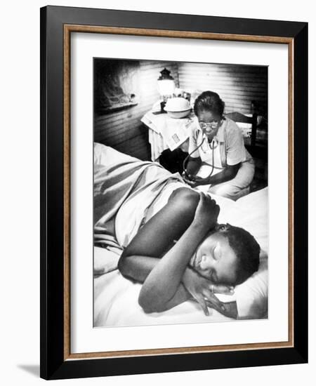 Famous Midwife-Nurse Maude Callen, Attending a Woman in Labor-W^ Eugene Smith-Framed Photographic Print