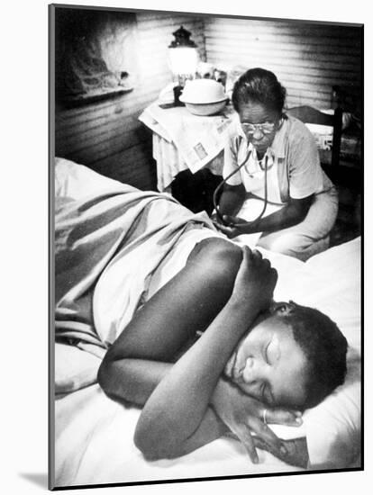 Famous Midwife-Nurse Maude Callen, Attending a Woman in Labor-W^ Eugene Smith-Mounted Photographic Print