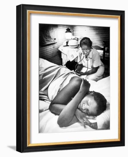 Famous Midwife-Nurse Maude Callen, Attending a Woman in Labor-W^ Eugene Smith-Framed Photographic Print