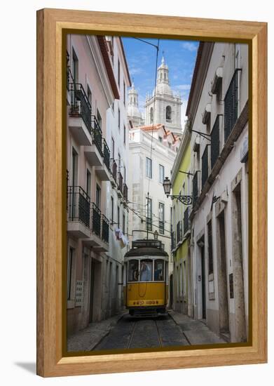 Famous Tram 28 Going Through the Old Quarter of Alfama, Lisbon, Portugal, Europe-Michael Runkel-Framed Premier Image Canvas