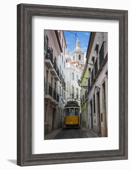 Famous Tram 28 Going Through the Old Quarter of Alfama, Lisbon, Portugal, Europe-Michael Runkel-Framed Photographic Print