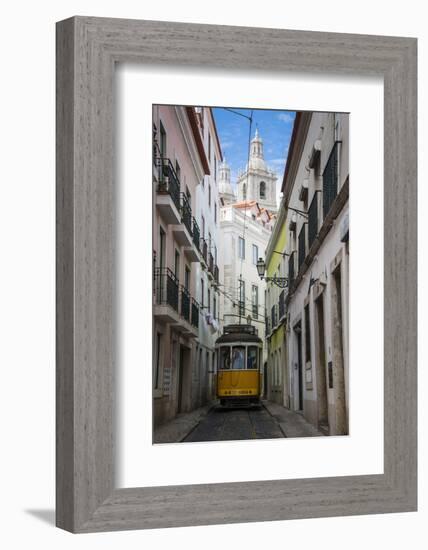 Famous Tram 28 Going Through the Old Quarter of Alfama, Lisbon, Portugal, Europe-Michael Runkel-Framed Photographic Print
