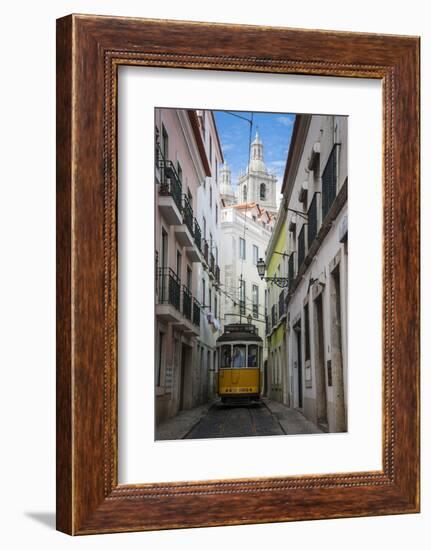 Famous Tram 28 Going Through the Old Quarter of Alfama, Lisbon, Portugal, Europe-Michael Runkel-Framed Photographic Print