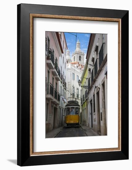 Famous Tram 28 Going Through the Old Quarter of Alfama, Lisbon, Portugal, Europe-Michael Runkel-Framed Photographic Print